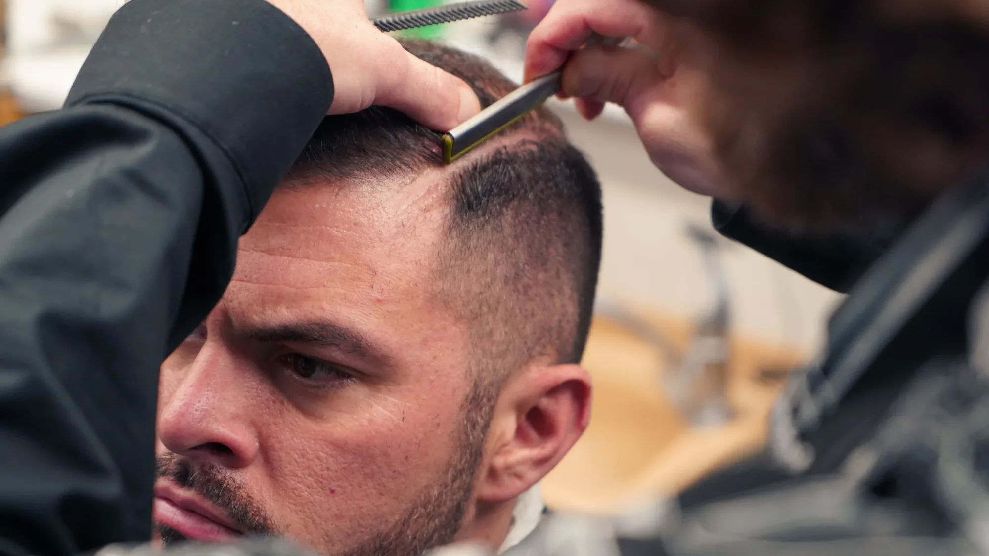 Profile view of a men's fade haircut at Ledgewood Barber Shop in Strongsville